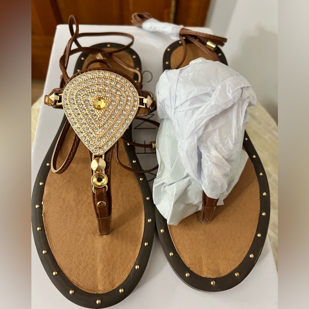 Beautiful sparkly sandals by Venus. Never worn.